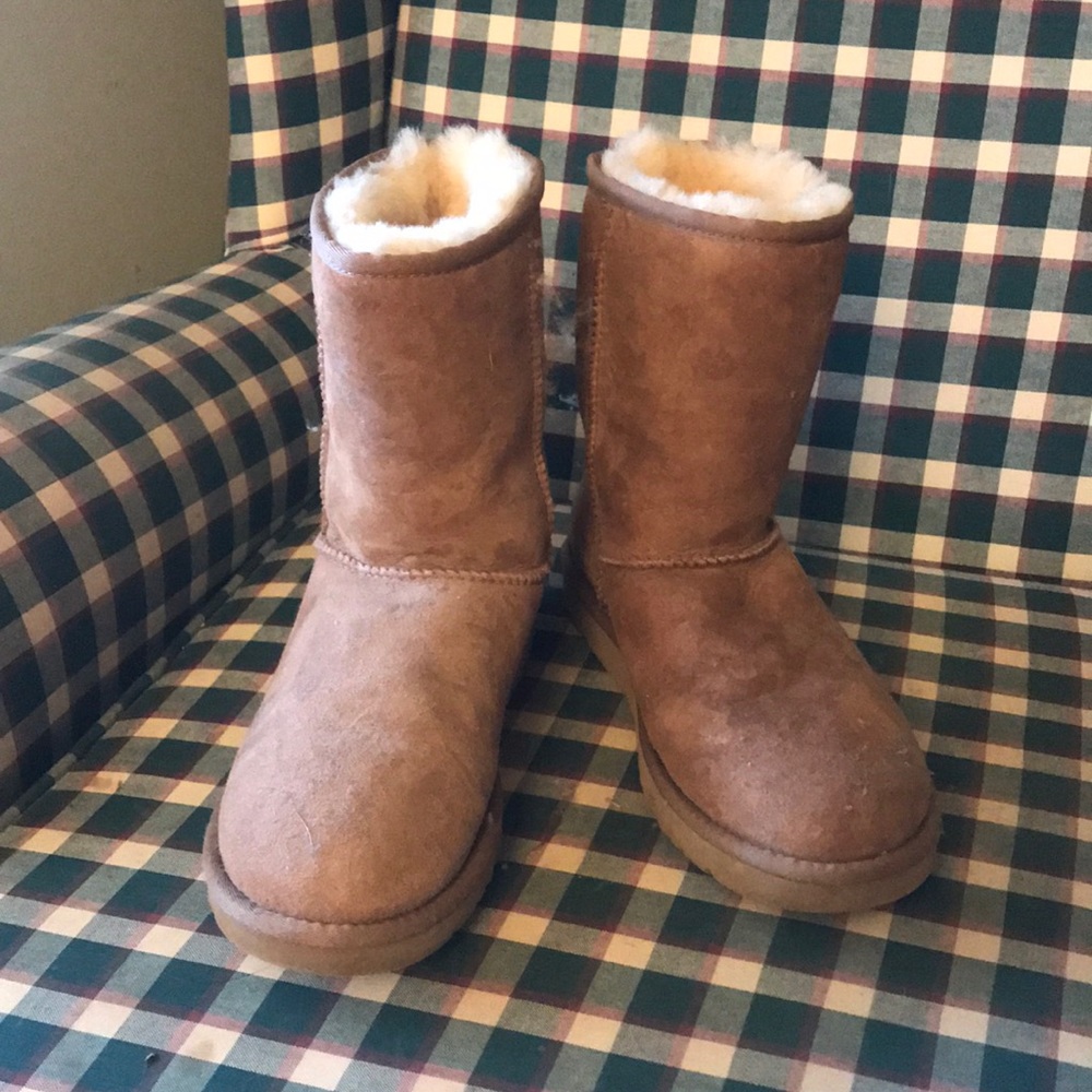 UGG with factory tear. Used